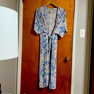 This pretty piece doubles as a wrap dress or robe, light weight sophistication